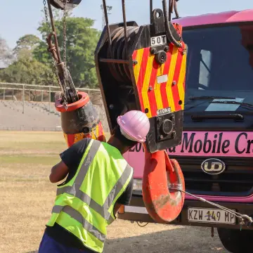 Picture of a crane operator working with rigging equipment